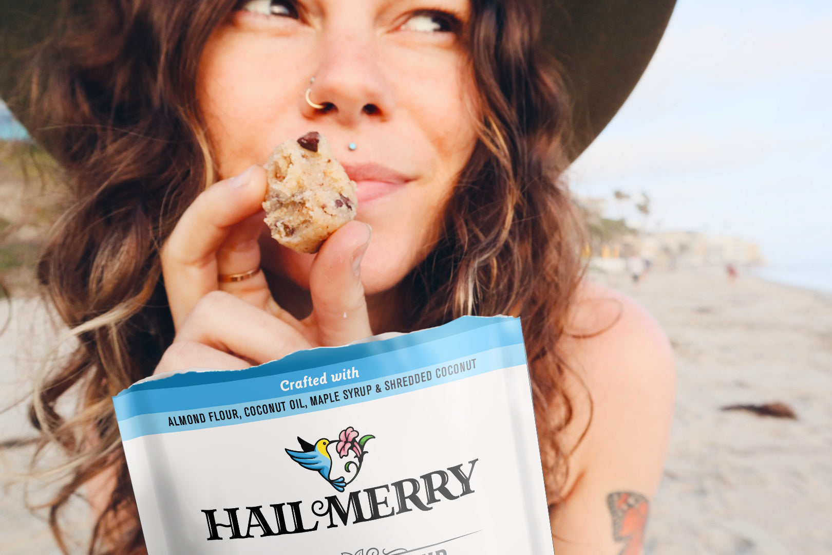 Woman holding a Hail Merry Vegan Chocolate Chip Cookie Dough Bite